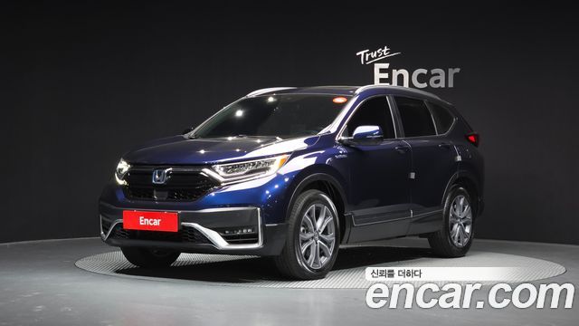 Honda CR-V 5-го поколения 2.0 Hybrid Touring 4WD - фото 0