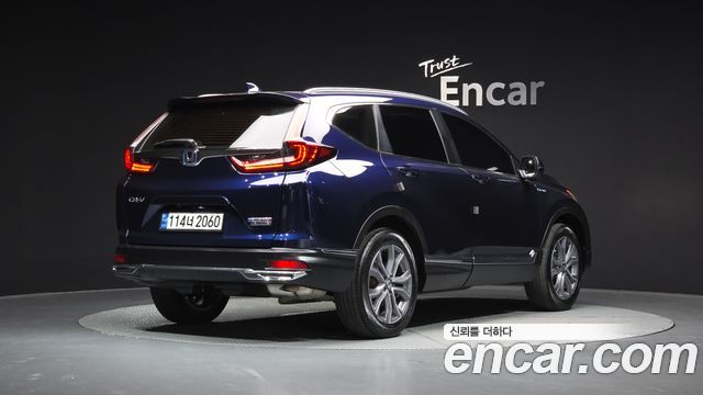 Honda CR-V 5-го поколения 2.0 Hybrid Touring 4WD - фото 1