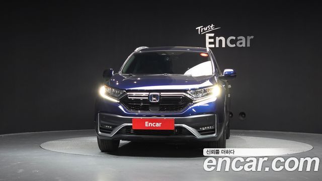 Honda CR-V 5-го поколения 2.0 Hybrid Touring 4WD - фото 2