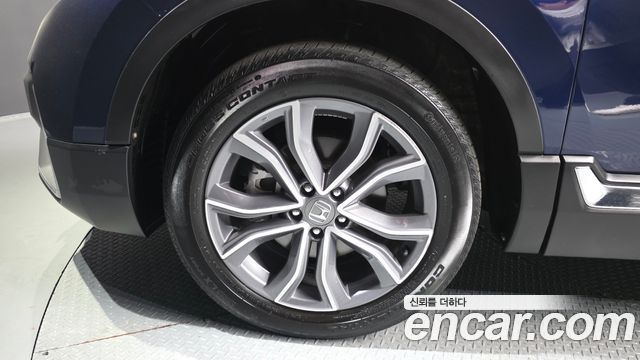 Honda CR-V 5-го поколения 2.0 Hybrid Touring 4WD - фото 4