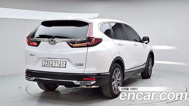 Honda CR-V 5-го поколения 2.0 Hybrid Touring 4WD - фото 1
