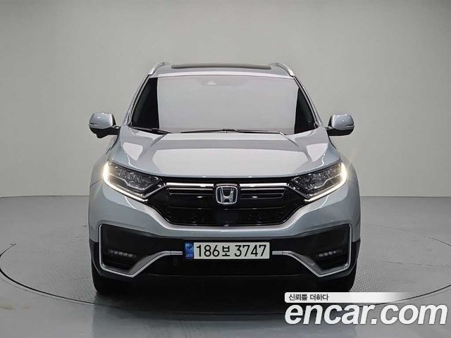 Honda CR-V 5-го поколения 2.0 Hybrid Touring 4WD - фото 1