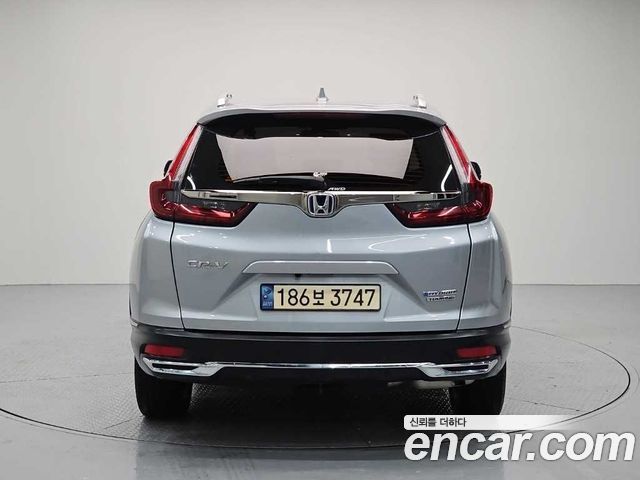 Honda CR-V 5-го поколения 2.0 Hybrid Touring 4WD - фото 2