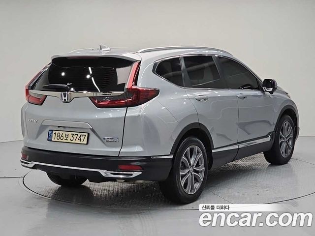 Honda CR-V 5-го поколения 2.0 Hybrid Touring 4WD - фото 3
