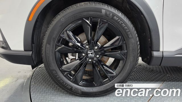 Honda CR-V 6-го поколения 2.0 Hybrid Touring 2WD - фото 4