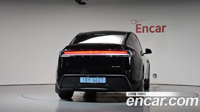 Tesla Model Y Long Range AWD - фото 2