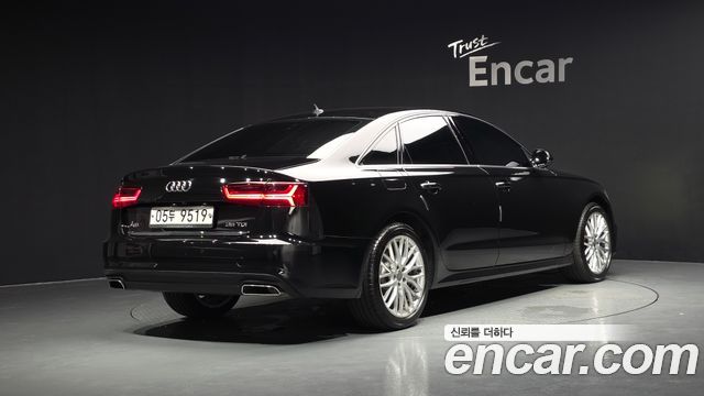 Audi A6 35 TDI Premium C7 - фото 1