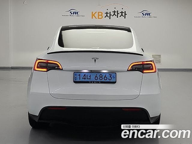 Tesla Model Y RWD - фото 2