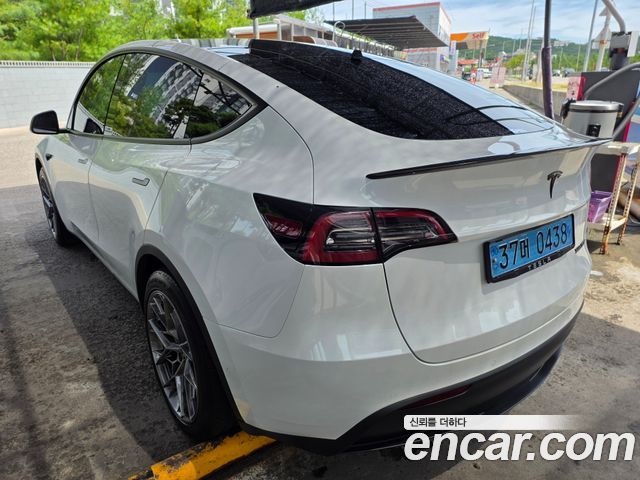 Tesla Model Y Long Range AWD - фото 1