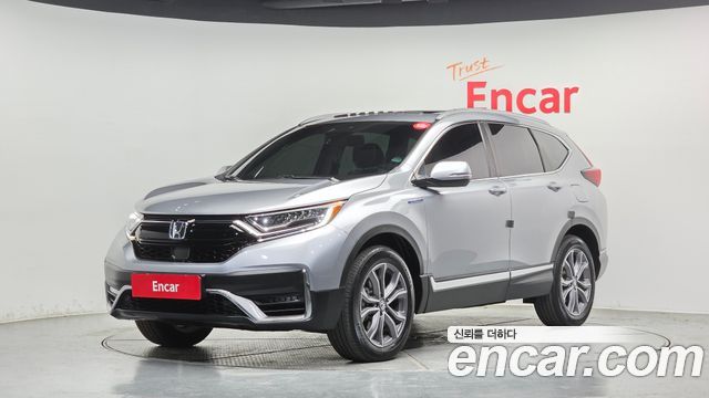 Honda CR-V 5-го поколения 2.0 Hybrid Touring 4WD - фото 0