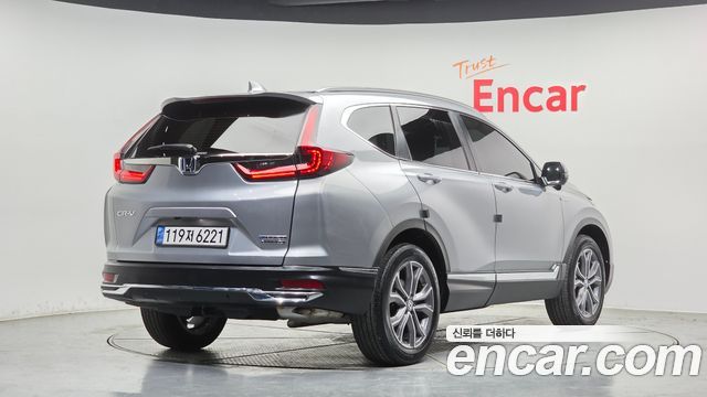 Honda CR-V 5-го поколения 2.0 Hybrid Touring 4WD - фото 1
