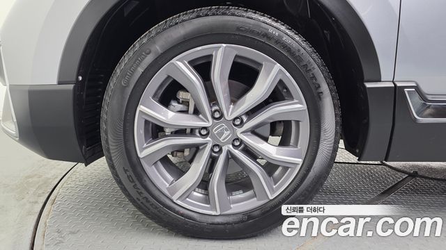 Honda CR-V 5-го поколения 2.0 Hybrid Touring 4WD - фото 4