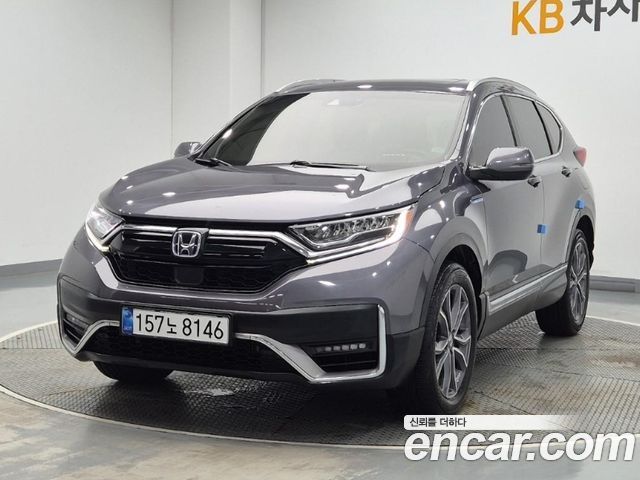Honda CR-V 5-го поколения 2.0 Hybrid Touring 4WD - фото 0