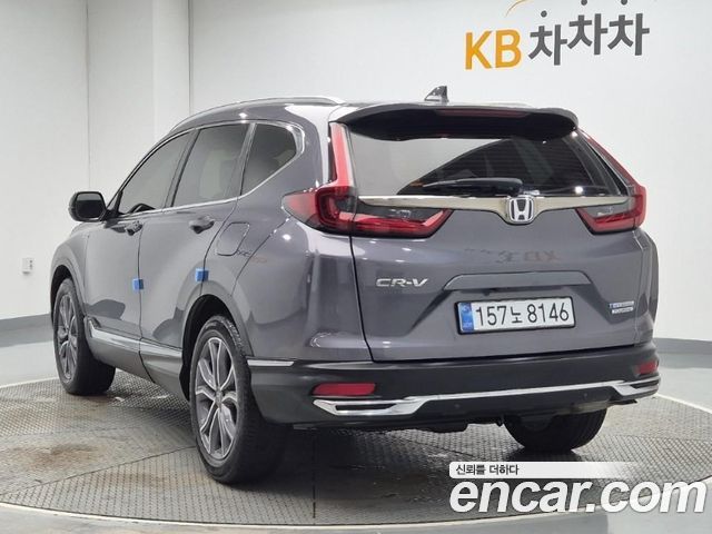 Honda CR-V 5-го поколения 2.0 Hybrid Touring 4WD - фото 1