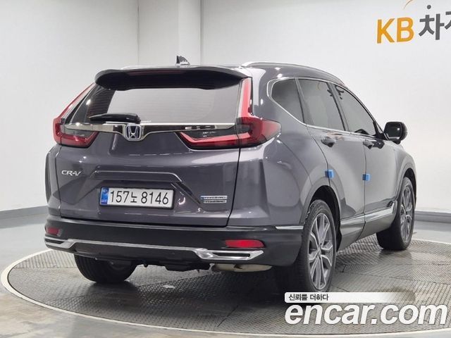 Honda CR-V 5-го поколения 2.0 Hybrid Touring 4WD - фото 2