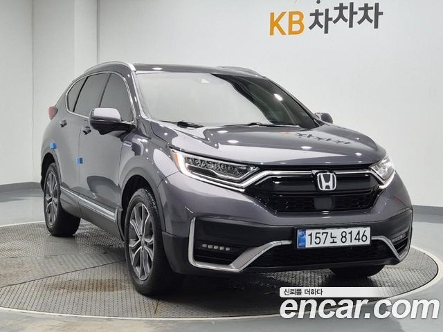 Honda CR-V 5-го поколения 2.0 Hybrid Touring 4WD - фото 3