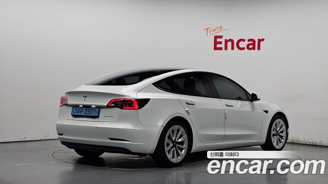 Tesla Model 3 Long Range AWD - фото 0