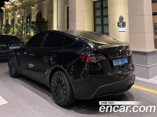 Tesla Model Y Long Range AWD - фото 1