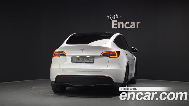 Tesla Model Y Long Range AWD - фото 2