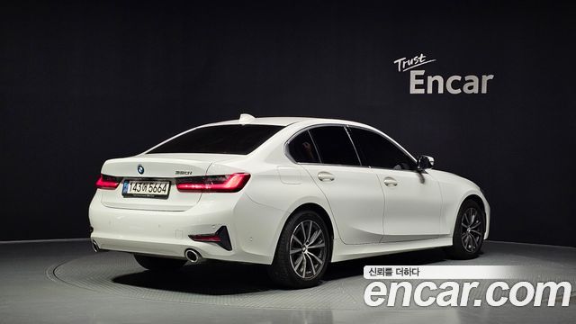 BMW 3 Series G20 320i - фото 1