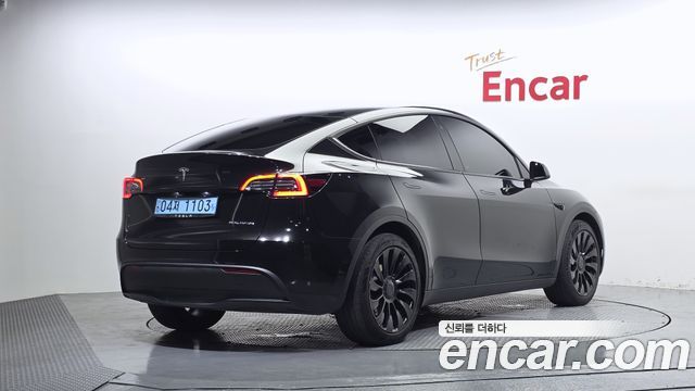 Tesla Model Y Long Range AWD - фото 1