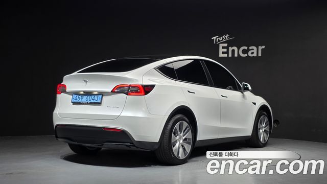 Tesla Model Y Long Range AWD - фото 1
