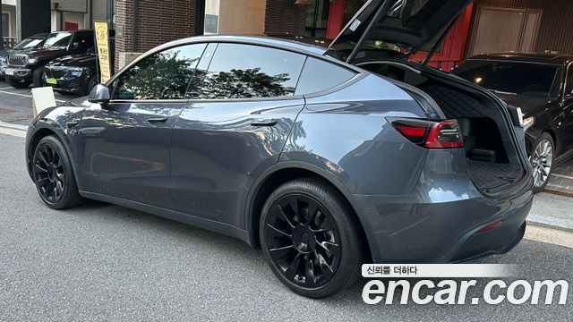 Tesla Model Y Long Range AWD - фото 1