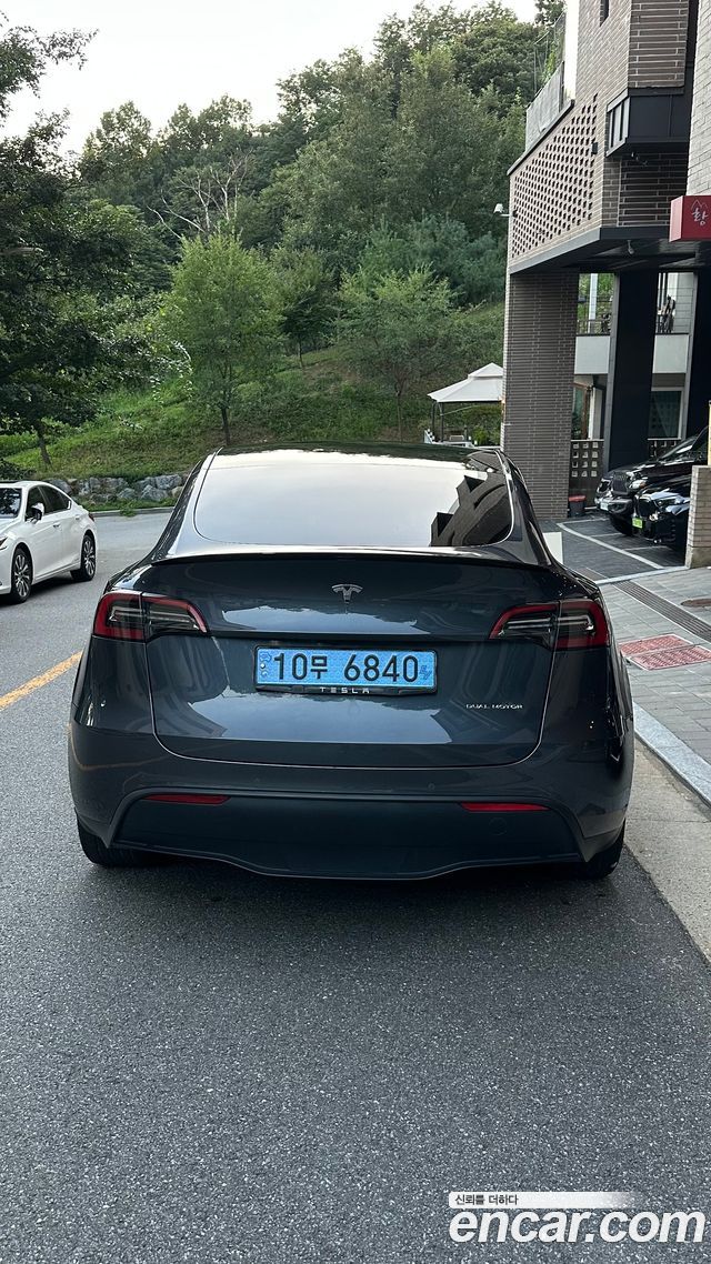 Tesla Model Y Long Range AWD - фото 3