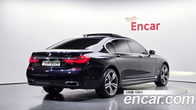 BMW 7 Series G11 730Ld xDrive M Sport - фото 1