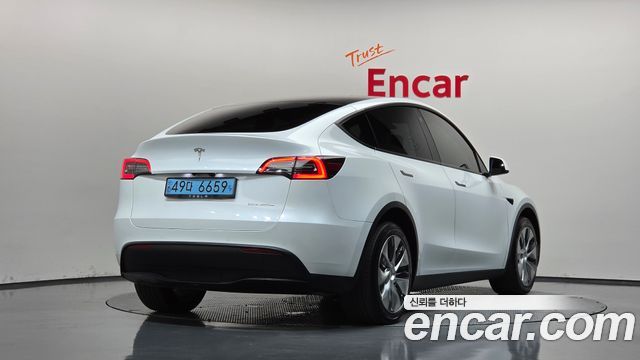 Tesla Model Y Long Range AWD - фото 1