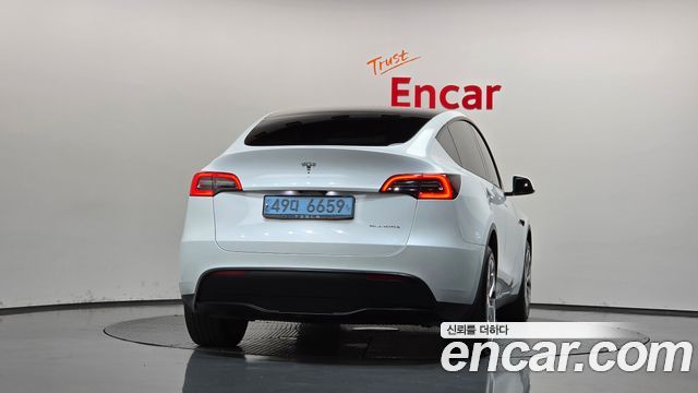Tesla Model Y Long Range AWD - фото 3