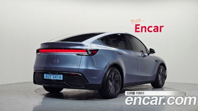 Tesla Model Y Long Range AWD - фото 1