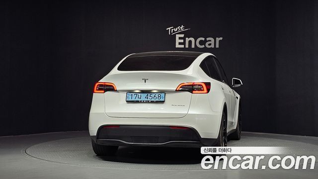 Tesla Model Y Long Range AWD - фото 3