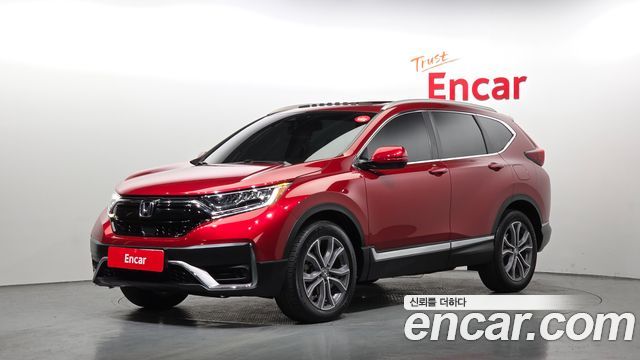 Honda CR-V 5-го поколения 1.5 Touring 4WD - фото 0