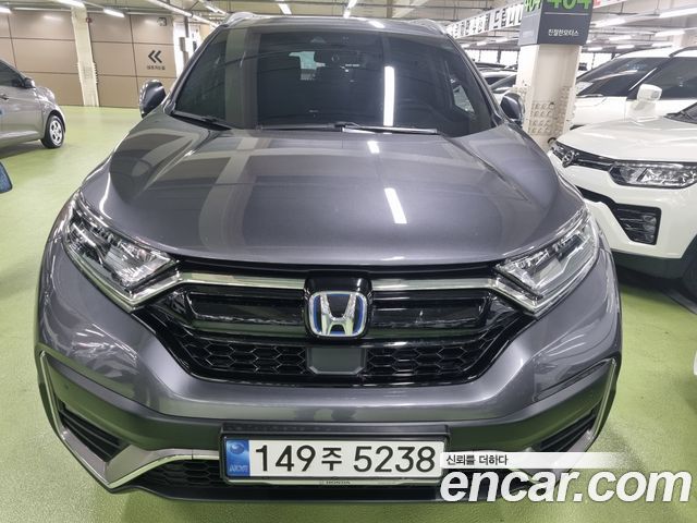 Honda CR-V 5-го поколения 2.0 Hybrid Touring 4WD - фото 0