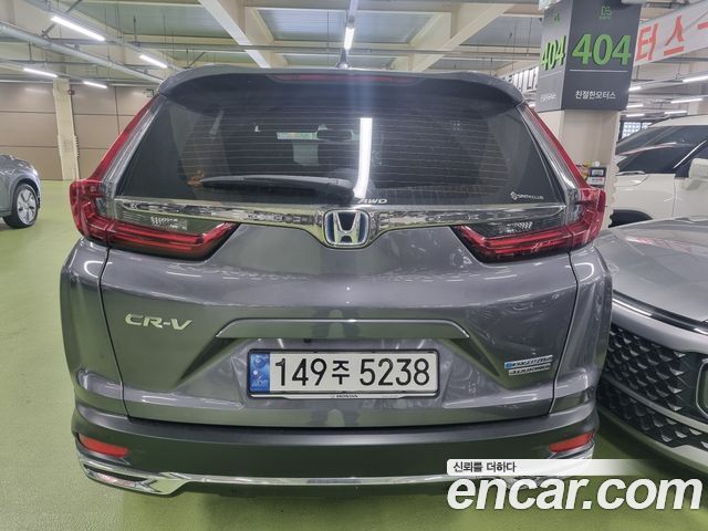 Honda CR-V 5-го поколения 2.0 Hybrid Touring 4WD - фото 1
