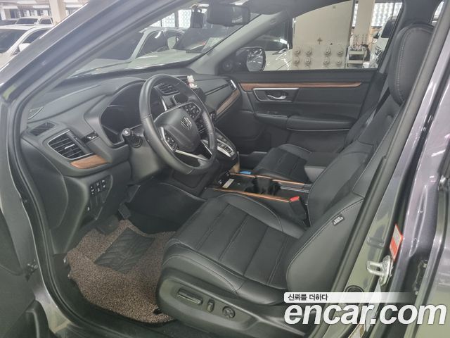 Honda CR-V 5-го поколения 2.0 Hybrid Touring 4WD - фото 4