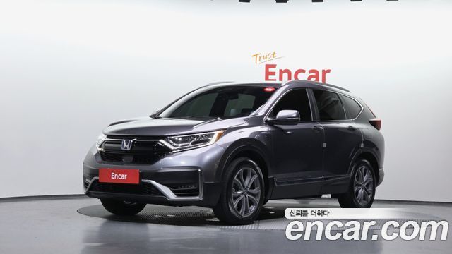 Honda CR-V 5-го поколения 2.0 Hybrid Touring 4WD - фото 0