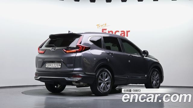Honda CR-V 5-го поколения 2.0 Hybrid Touring 4WD - фото 1