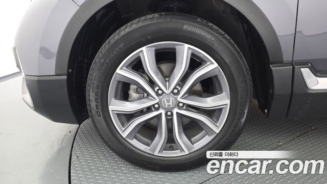 Honda CR-V 5-го поколения 2.0 Hybrid Touring 4WD - фото 4