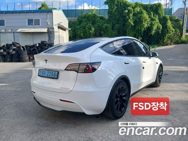 Tesla Model Y Long Range AWD - фото 2