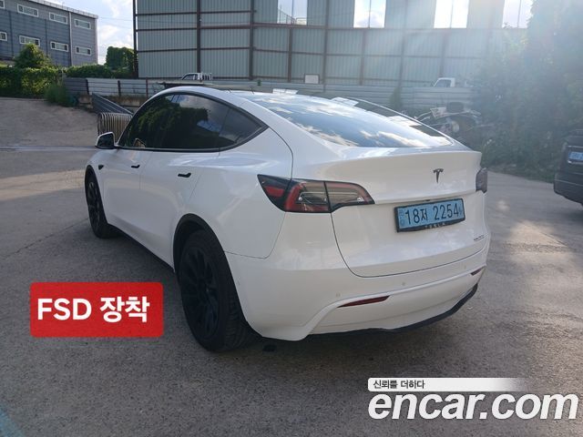 Tesla Model Y Long Range AWD - фото 3