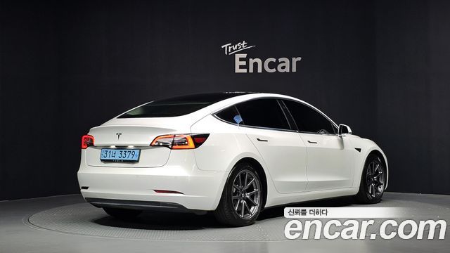 Tesla Model 3 Standard Range Plue RWD - фото 1