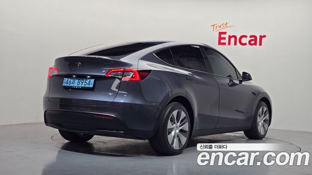 Tesla Model Y Long Range AWD - фото 1