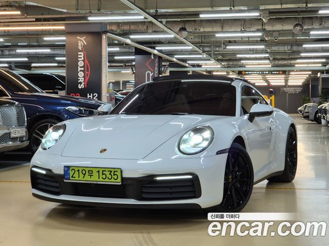 Porsche 911 Carrera 4 - фото 0