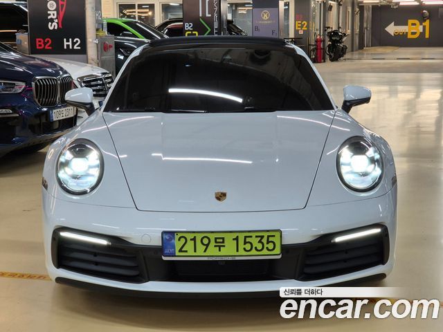 Porsche 911 Carrera 4 - фото 1