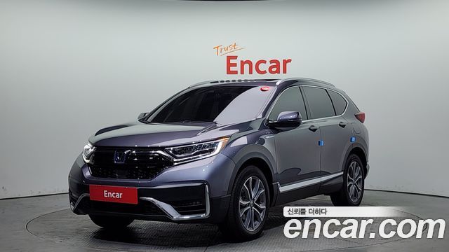 Honda CR-V 5-го поколения 2.0 Hybrid Touring 4WD - фото 0