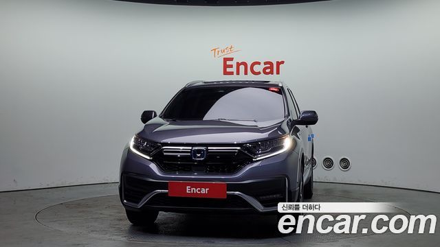 Honda CR-V 5-го поколения 2.0 Hybrid Touring 4WD - фото 2