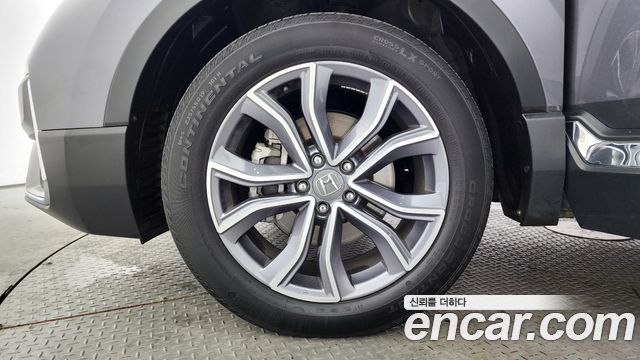 Honda CR-V 5-го поколения 2.0 Hybrid Touring 4WD - фото 4