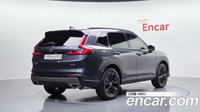 Honda CR-V 6-го поколения 2.0 Hybrid Touring 4WD - фото 1
